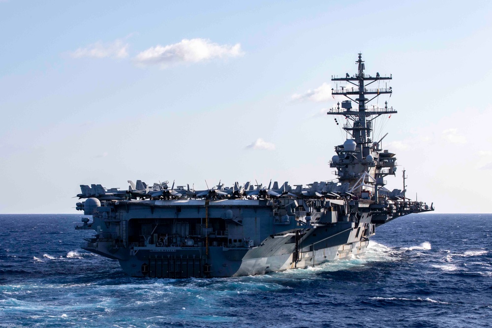 USS Ralph Johnson Conducts Replenishment at Sea with USS Ronald Reagan