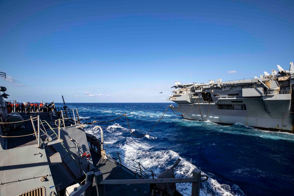 USS Ralph Johnson Conducts Replenishment at Sea with USS Ronald Reagan