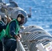 USS Ronald Reagan (CVN 76) conducts fueling-at-sea with Arleigh Burke-class  guided-missile destroyer USS Ralph Johnson (DDG 114)