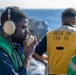 USS Ronald Reagan (CVN 76) conducts fueling-at-sea with Arleigh Burke-class  guided-missile destroyer USS Ralph Johnson (DDG 114)