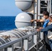 USS Ronald Reagan (CVN 76) conducts fueling-at-sea with Arleigh Burke-class  guided-missile destroyer USS Ralph Johnson (DDG 114)