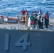 USS Ronald Reagan (CVN 76) conducts fueling-at-sea with Arleigh Burke-class  guided-missile destroyer USS Ralph Johnson (DDG 114)