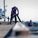USS Ronald Reagan (CVN 76) conducts fueling-at-sea with Arleigh Burke-class  guided-missile destroyer USS Ralph Johnson (DDG 114)