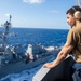USS Ronald Reagan (CVN 76) conducts fueling-at-sea with  USS Ralph Johnson (DDG 114)