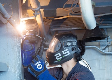 USS Ronald Reagan (CVN 76) Sailors weld and  repair equipment