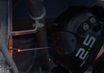 USS Ronald Reagan (CVN 76) Sailors weld and  repair equipment