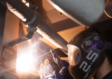 USS Ronald Reagan (CVN 76) Sailors weld and  repair equipment