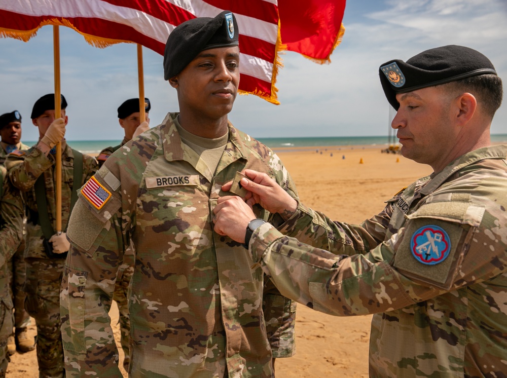 Signal Soldier promotes on Omaha Beach