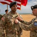 Signal Soldier promotes on Omaha Beach