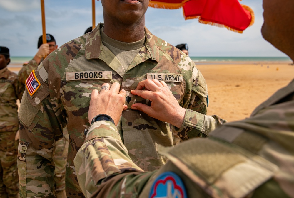 Signal Soldier promotes on Omaha Beach