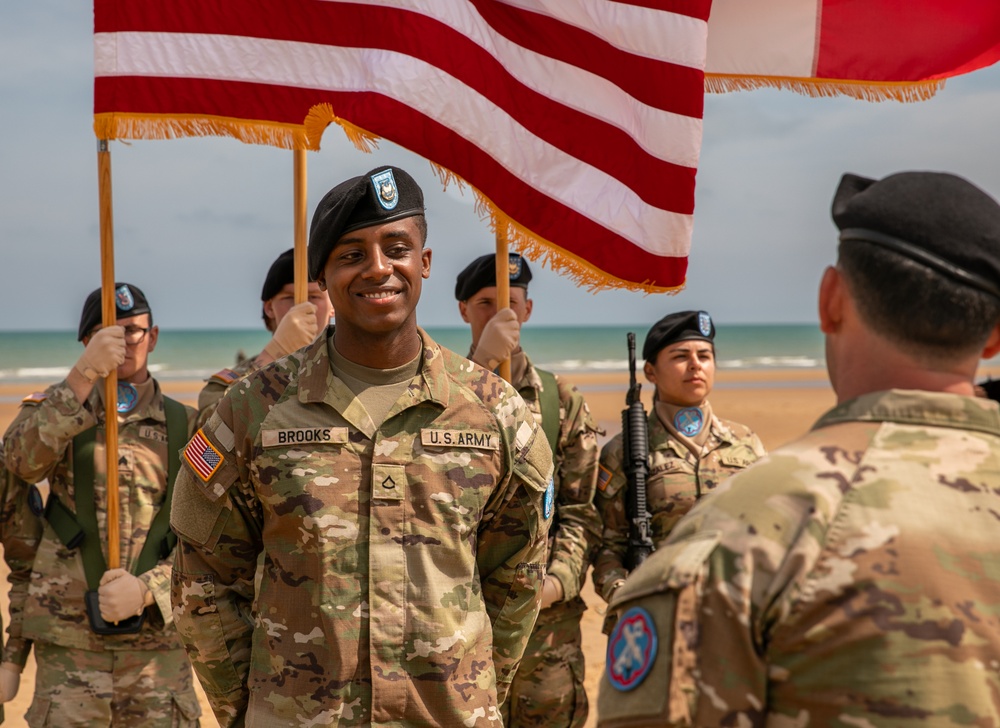 Signal Soldier promotes on Omaha Beach