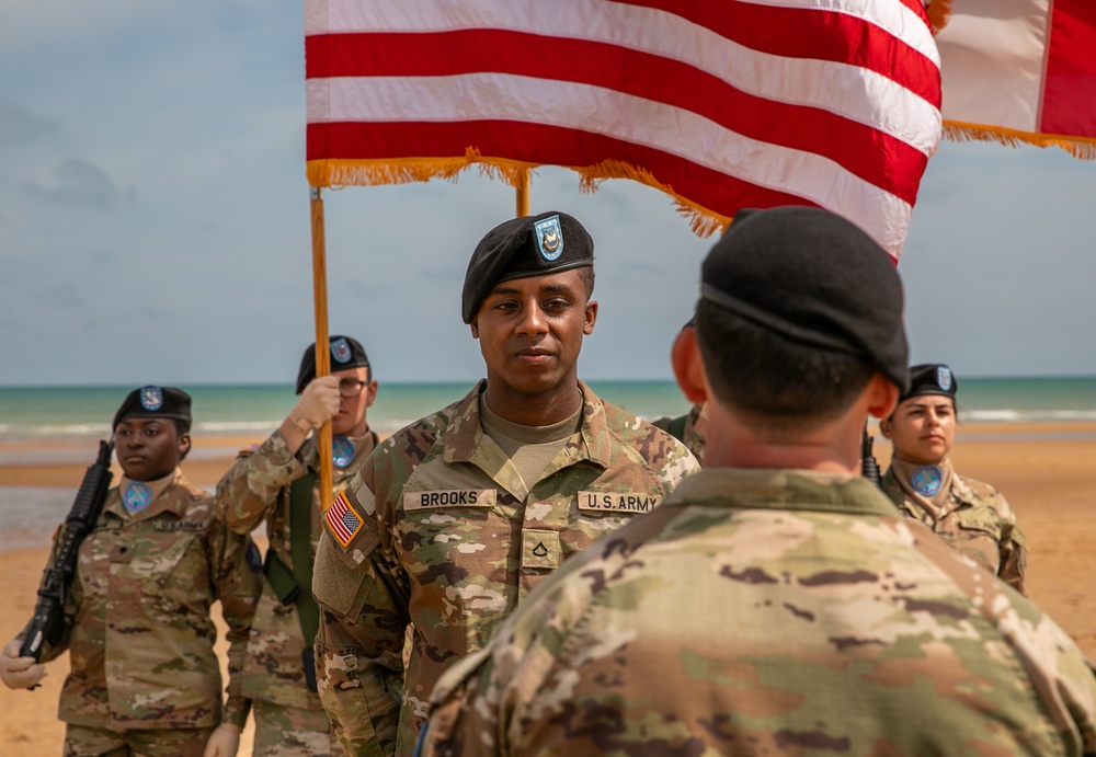 Signal Soldier promotes on Omaha Beach