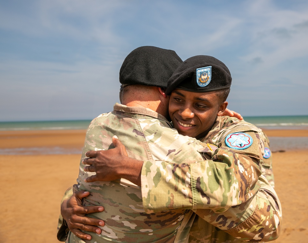 Signal Soldier promotes on Omaha Beach