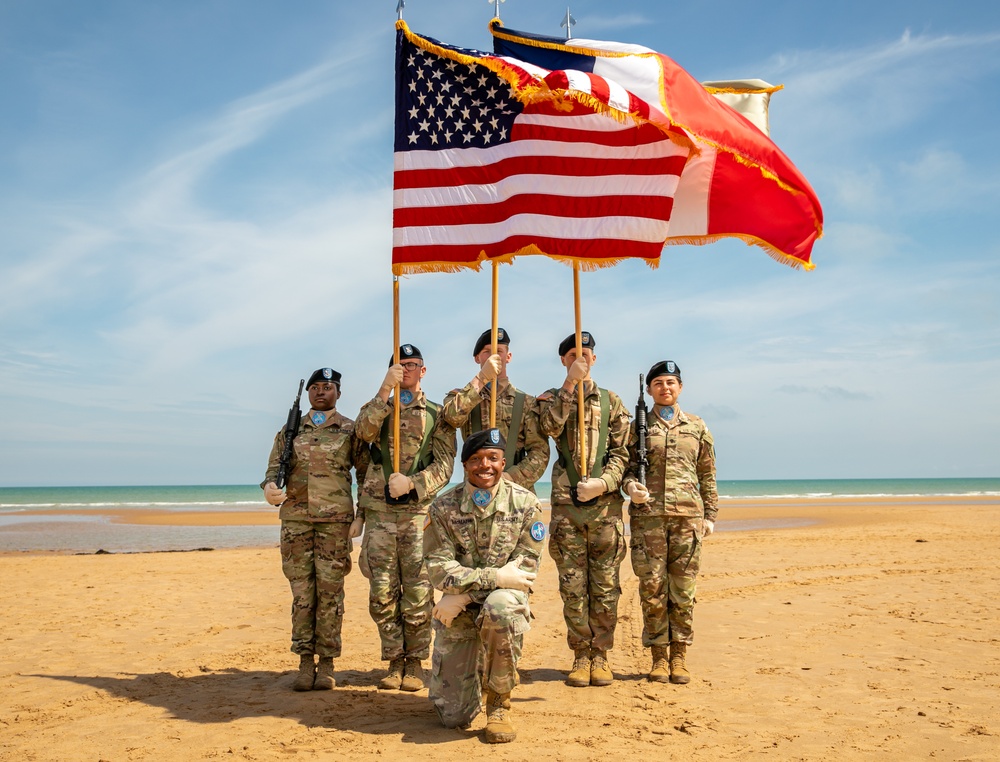 Signal Soldier promotes on Omaha Beach