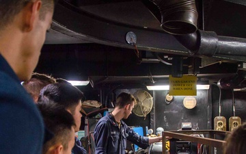 USS Ronald Reagan (CVN 76) Midshipmen tour machine  repair shop during summer cruise