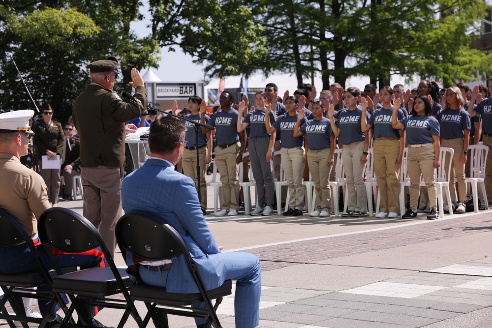 Enlistees raise their right hand at IMS