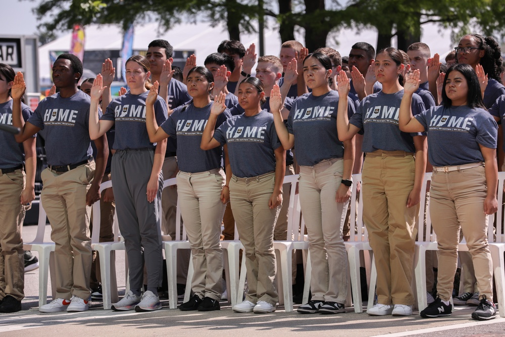 Enlistees raise their right hand at IMS