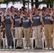 Enlistees raise their right hand at IMS