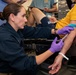 Sailors and staff with U.S. Fleet Forces, Naval Medical Forces Atlantic, Naval Air Force Atlantic and Naval Medical Forces Pacific conduct Quality Medical Assist Visit aboard USS Harry S. Truman (CVN 75)