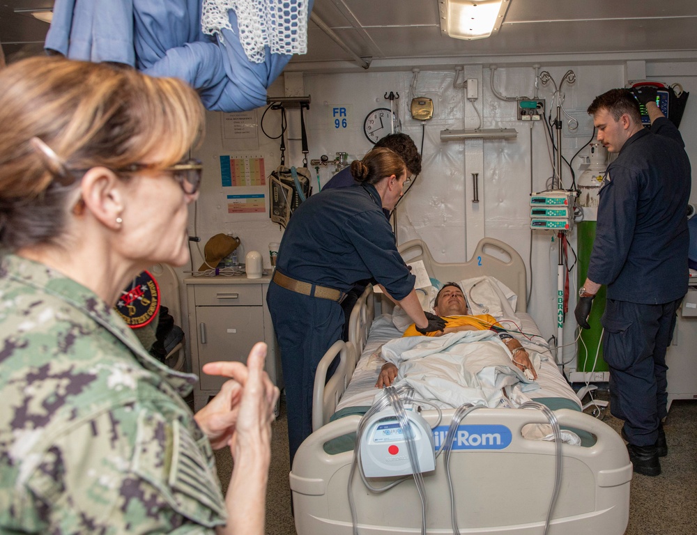 Sailors and staff with U.S. Fleet Forces, Naval Medical Forces Atlantic, Naval Air Force Atlantic and Naval Medical Forces Pacific conduct Quality Medical Assist Visit aboard USS Harry S. Truman (CVN 75)