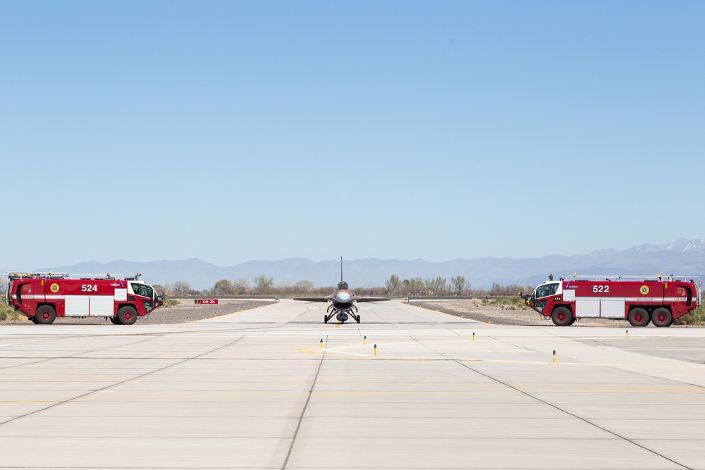 Admiral Aquilino Taxis His Aircraft to Flightline Overhang