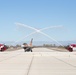 Admiral Aquilino Taxis His Aircraft to Flightline Overhang