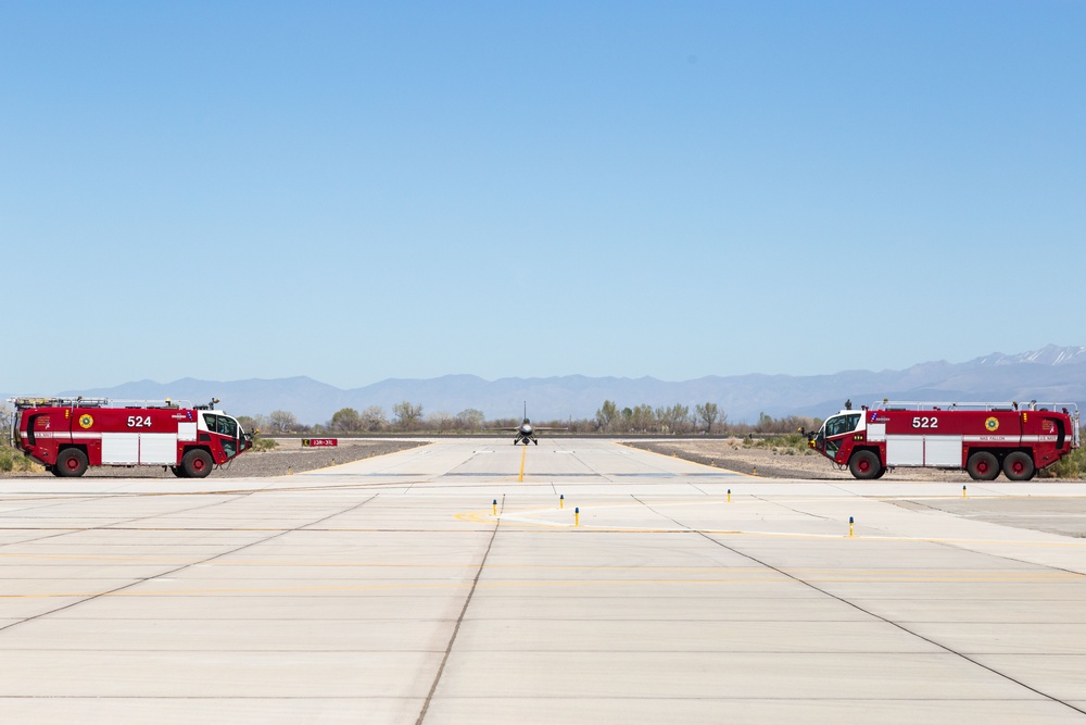 Admiral Aquilino Taxis His Aircraft to Flightline Overhang