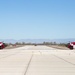 Admiral Aquilino Taxis His Aircraft to Flightline Overhang