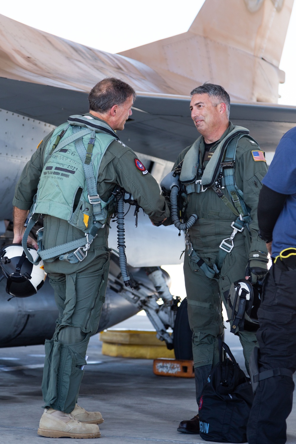 Admiral Aquilino Departs Aircraft After Final Flight