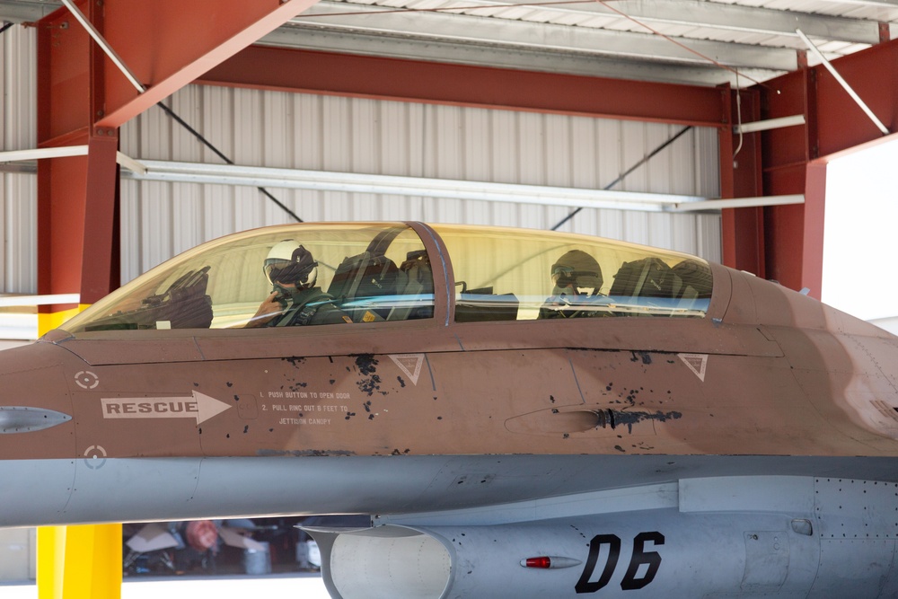 Admiral Aquilino Taxis His Aircraft to Flightline Overhang