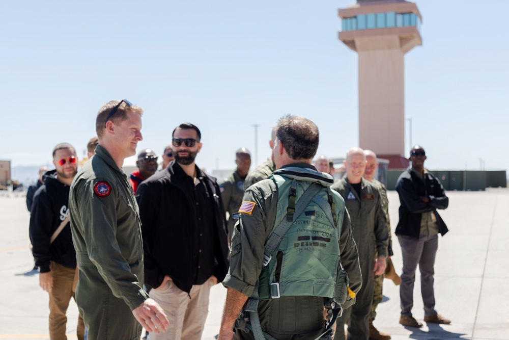 Admiral Aquilino is Greeted by INDOPACIFIC and NAWDC Personnel