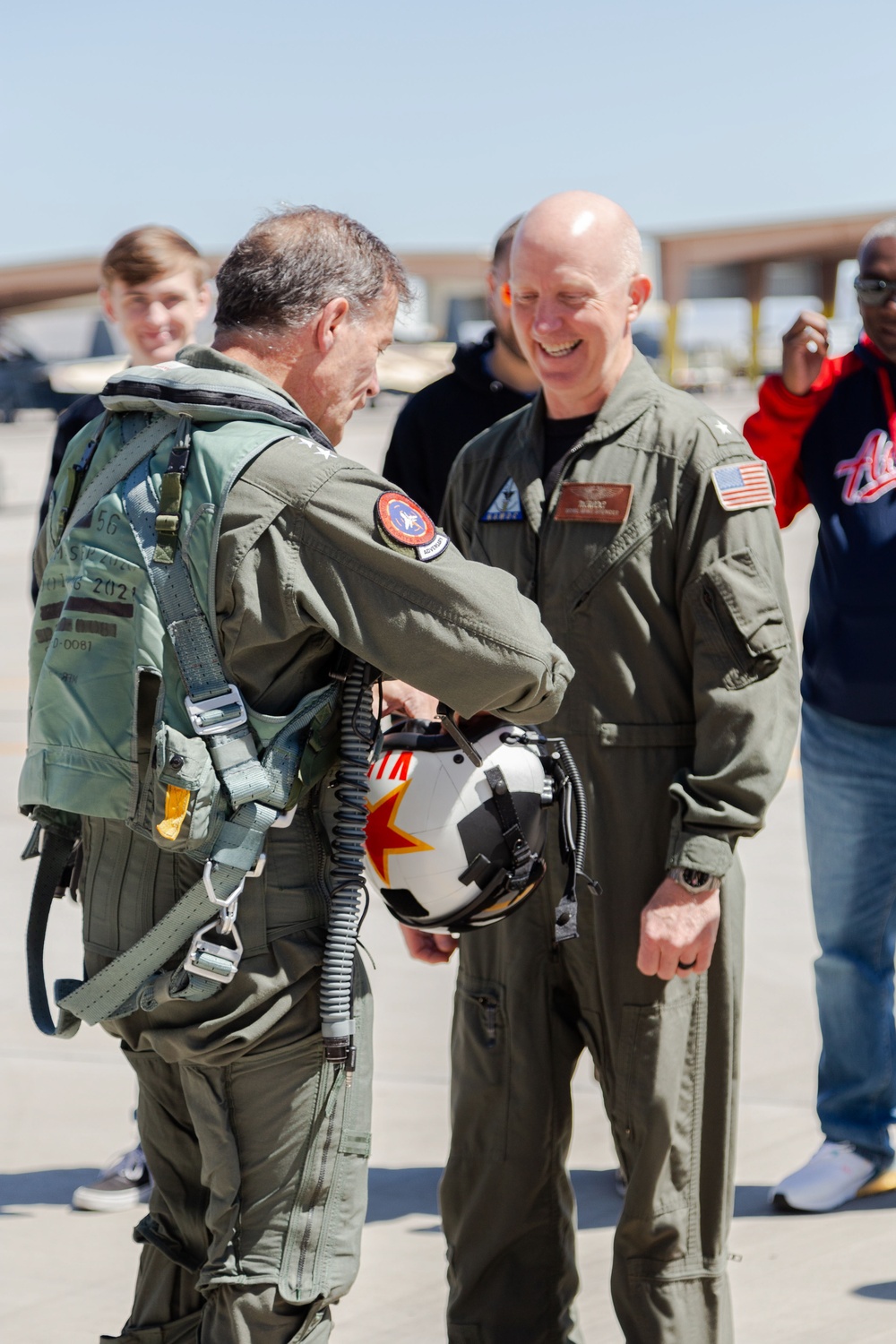 Admiral Aquilino is Greeted by NAWDC Commander, Rear Admiral Spencer