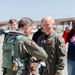 Admiral Aquilino is Greeted by NAWDC Commander, Rear Admiral Spencer