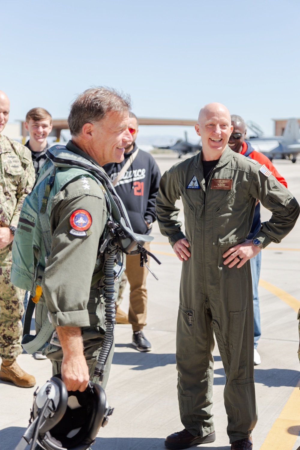 Admiral Aquilino is Greeted by NAWDC Commander, Rear Admiral Spencer