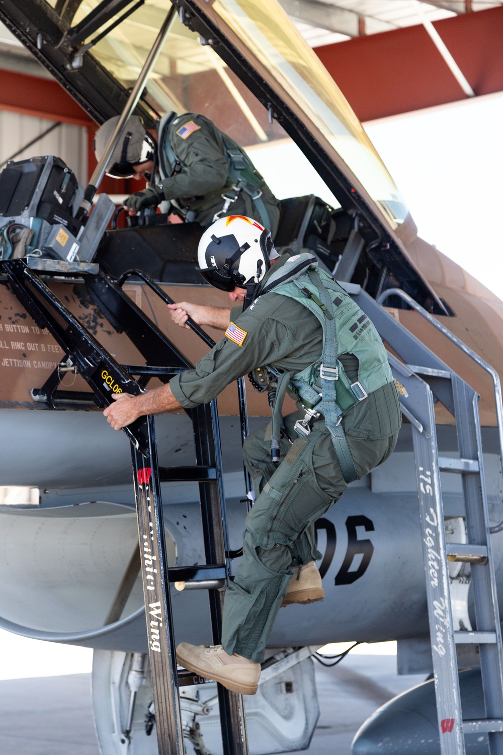 Admiral Aquilino Departs Aircraft After Final Flight