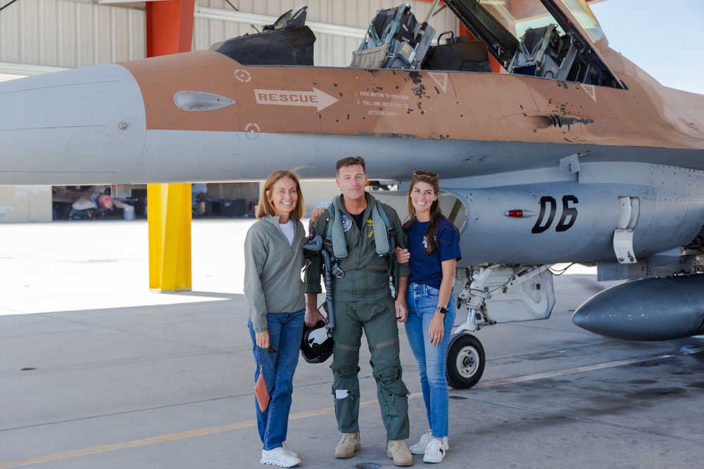 Admiral Aquilino Poses with Family for Group Photo