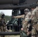 U.S. Army Sgt. Timothy Cassinera and Sgt. Dillon Johnson of Alpha Company, 2-285th Assault Helicopter Battalion and Bravo Company 2-285th Aviation Regiment, instructs Soldiers in and out of a Black Hawk helicopter