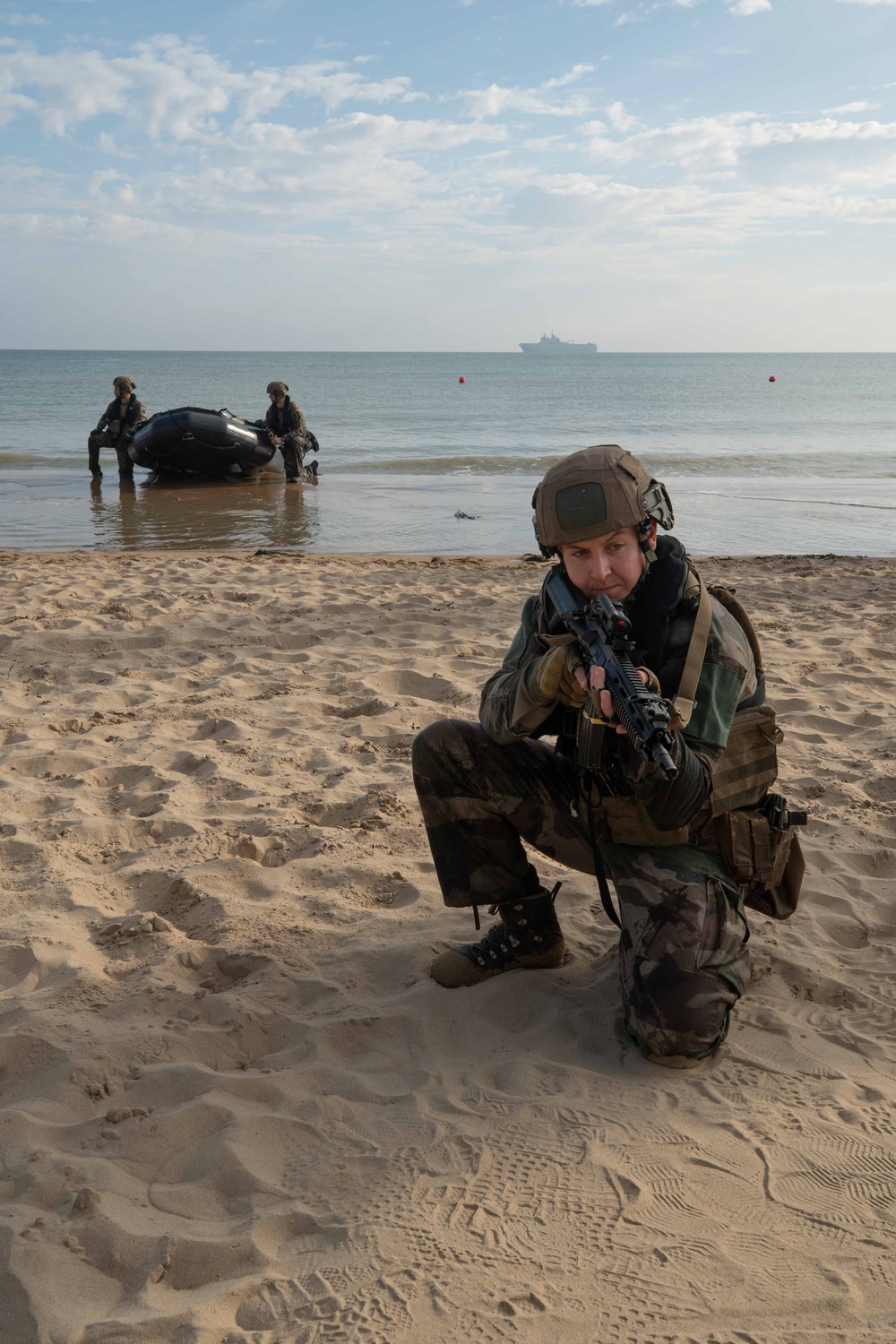 U.S. and French Marines practice maneuvers over Omaha Beach