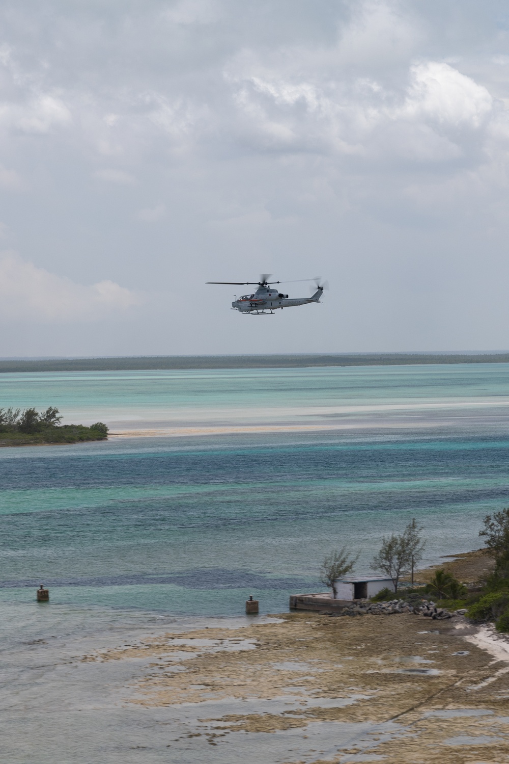 U.S. Marines with HMLA-167 perform a terrain-familiarization flight during Distributed Aviation Operations Exercise 24