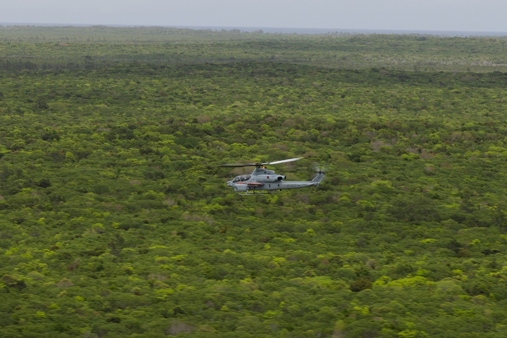 U.S. Marines with HMLA-167 perform a terrain-familiarization flight during Distributed Aviation Operations Exercise 24