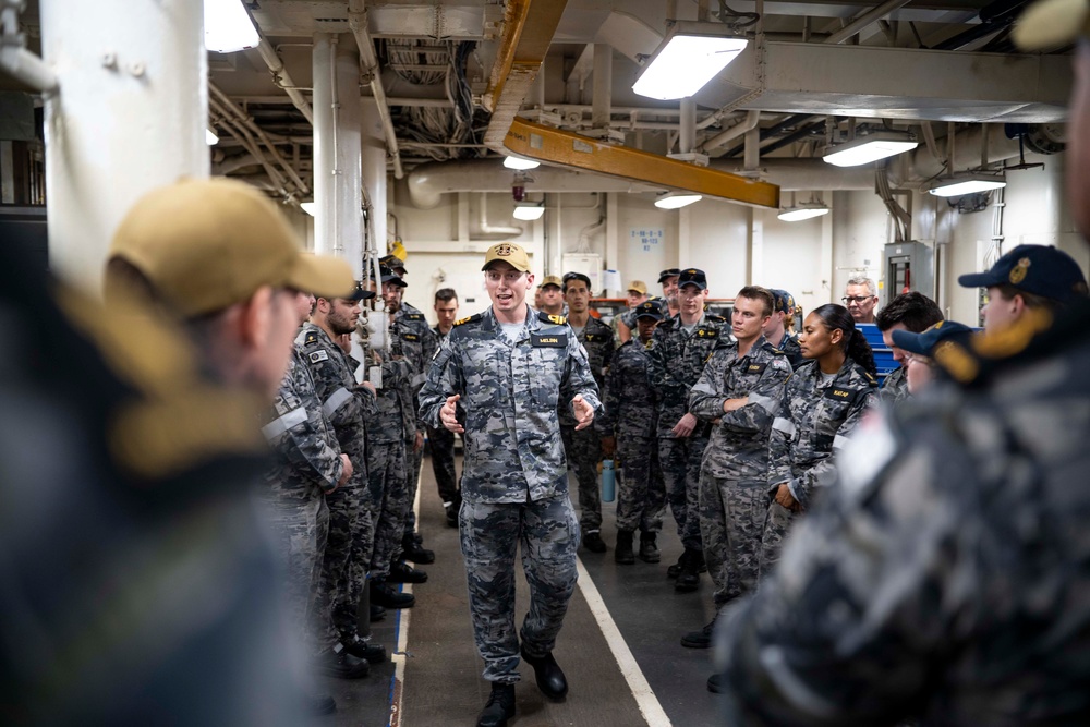 RAN sailors from Fleet Support Unit North, Fleet Logistic Support Element and Port Services during a tour of the tender