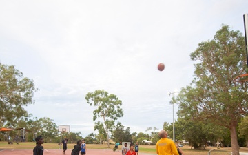 USS Emory S. Land Sailors Play Basketball with Members of the Malak Community