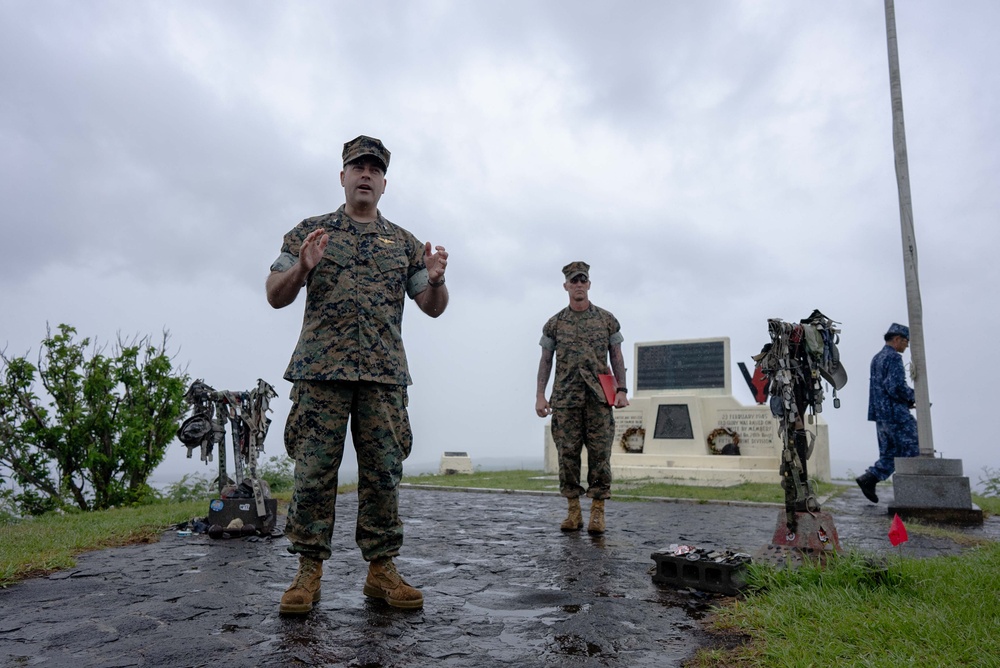 U.S. Marines, Sailors, and Japanese government officials visit Iwo Jima to observe Carrier Air Wing 5 field carrier landing practice.