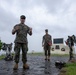 U.S. Marines, Sailors, and Japanese government officials visit Iwo Jima to observe Carrier Air Wing 5 field carrier landing practice.