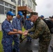 U.S. Marines, Sailors, and Japanese government officials visit Iwo Jima to observe Carrier Air Wing 5 field carrier landing practice.