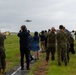 U.S. Marines, Sailors, and Japanese government officials visit Iwo Jima to observe Carrier Air Wing 5 field carrier landing practice.