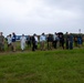 U.S. Marines, Sailors, and Japanese government officials visit Iwo Jima to observe Carrier Air Wing 5 field carrier landing practice.