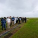 U.S. Marines, Sailors, and Japanese government officials visit Iwo Jima to observe Carrier Air Wing 5 field carrier landing practice.