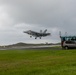 U.S. Marines, Sailors, and Japanese government officials visit Iwo Jima to observe Carrier Air Wing 5 field carrier landing practice.