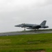 U.S. Marines, Sailors, and Japanese government officials visit Iwo Jima to observe Carrier Air Wing 5 field carrier landing practice.